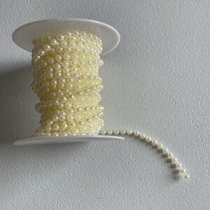 3/$5 Approximately 10 yards of plastic pearl strand